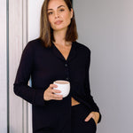 Woman wearing long ribbed modal pyjamas set in black colour – Le Rose Stories