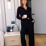Model wearing a full-length view of drawstring ribbed lounge pants